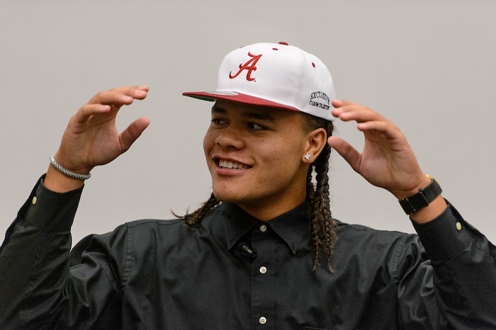 (Trent Nelson  |  The Salt Lake Tribune)  Olympus tight end Cameron Latu announces he's headed to Alabama during a news conference at Olympus High School in Salt Lake City Friday August 4, 2017.