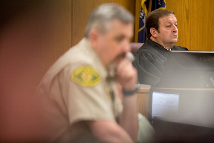 Judge James Brady listens to the prosecuting attorney, Chad Grunander, during Tyerell Przybycien's sentencing in the 4th District Court on Friday, Dec. 7, 2018, in Provo.