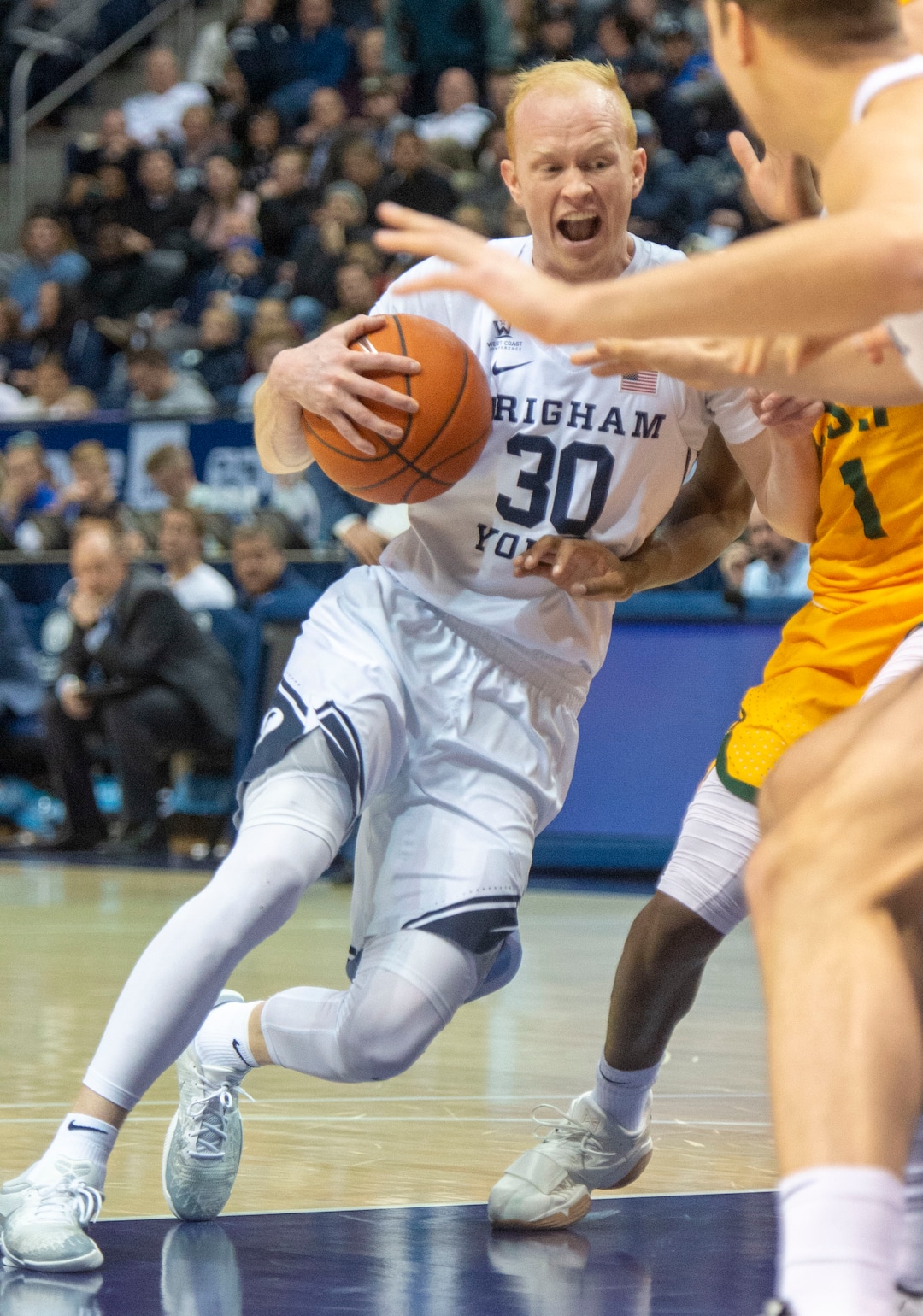 (Rick Egan  |  The Salt Lake Tribune)  Brigham Young Cougars guard TJ Haws (30) drives to the hoop, in WCC basketball action at the Marriott Center, Thursday, February 21, 2018.