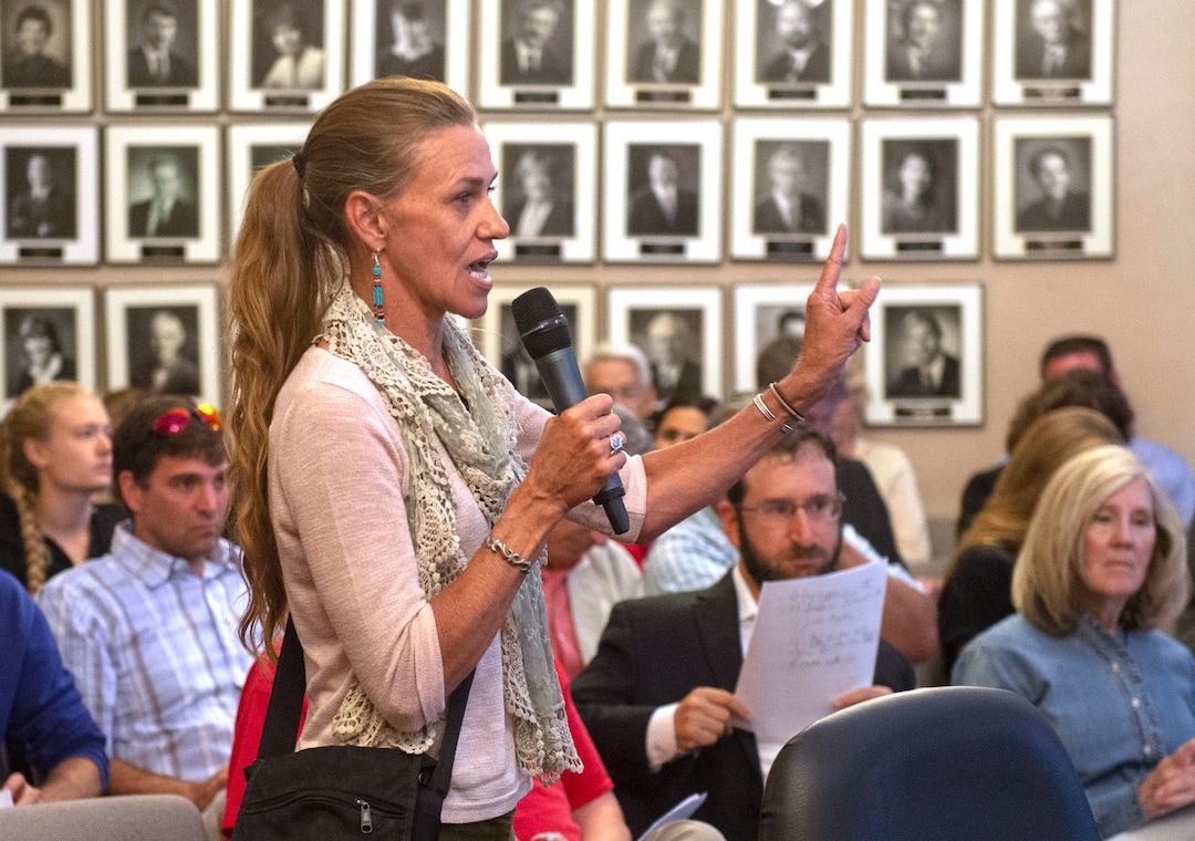(Rick Egan  |  The Salt Lake Tribune)     Robyn Adamson urges the City Council to vote no on a proposal that would grant up to $28 million in tax increment reimbursement to a developer seeking to build a 3,000 acre industrial development in the city’s northwest side, The council voted yes on the proposal, during a Salt Lake City Council redevelopment agency meeting. Tuesday, Aug. 27, 2019.