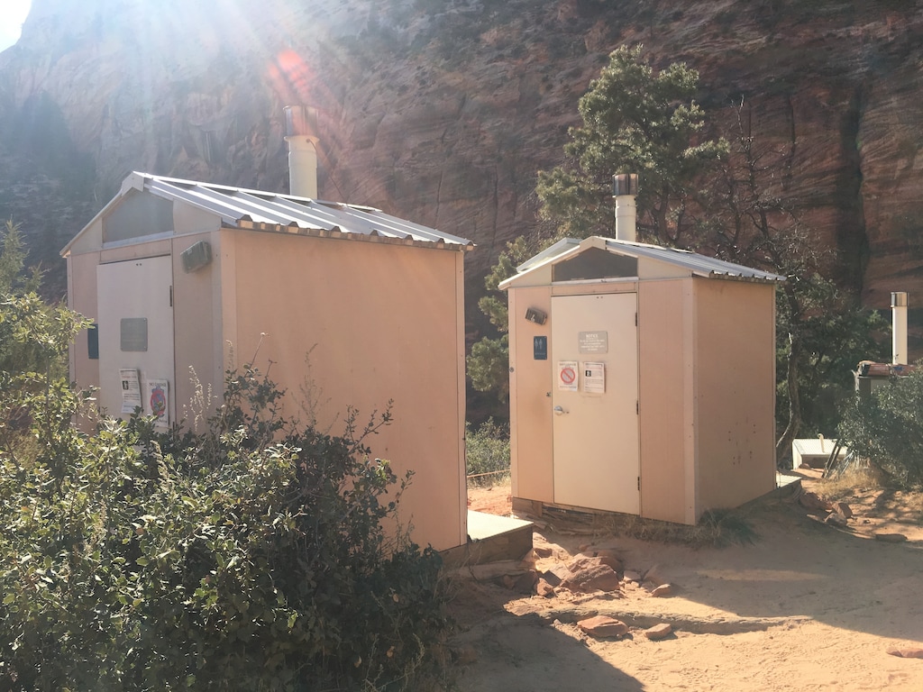 (Brian Maffly | Salt Lake Tribune). Zion National Park maintains these two outhouses for "emergency" use at Scout Lookout, a popular destination on the West Rim Trail where intrepid hikers head to Angels Landing. Maintaining these toilets, whose stench mars an otherwise breathtaking experience,  is an expensive, unpleasant chore for park staff. This week, park managers closed the trail for two mornings while helicopters ferried out 32 barrels of human waste.
