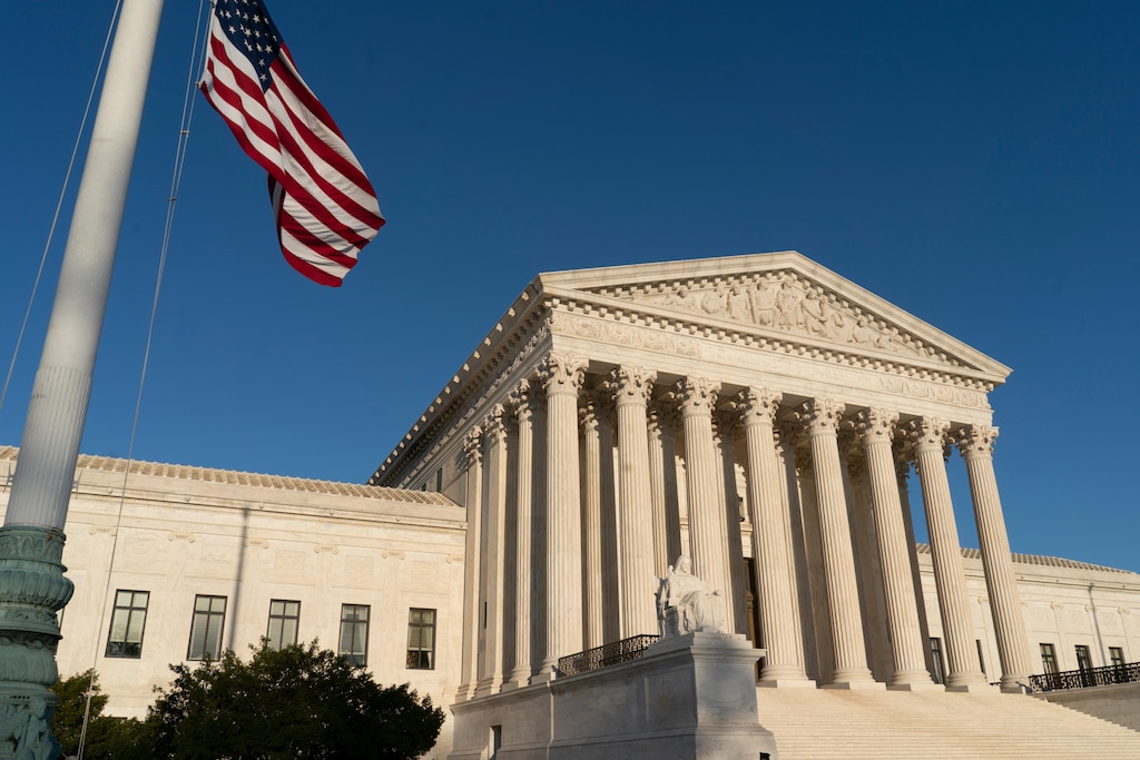 (AP Photo/J. Scott Applewhite) In this April 20, 2018, file photo, the Supreme Court is seen in Washington.  The Supreme Court is setting aside a Colorado court ruling against a baker who wouldn’t make a wedding cake for a same-sex couple. But the court is not deciding the big issue in the case, whether a business can refuse to serve gay and lesbian people.