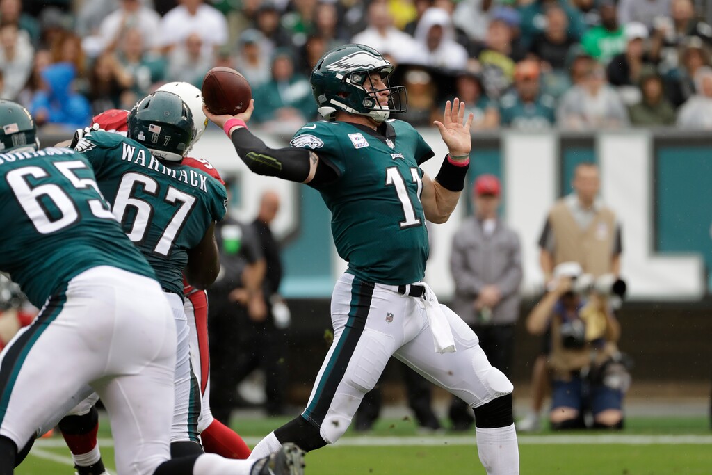 Philadelphia Eagles' Carson Wentz in action during the first half of an NFL football game against the Arizona Cardinals, Sunday, Oct. 8, 2017, in Philadelphia. (AP Photo/Michael Perez)