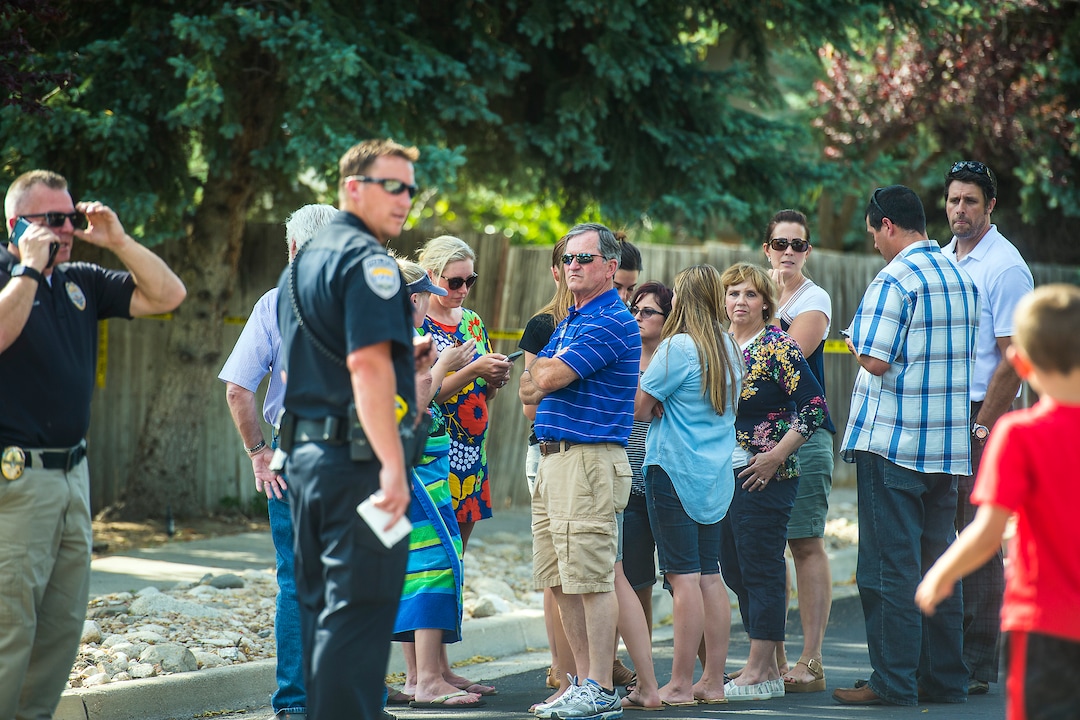 Chris Detrick  |  The Salt Lake TribuneCommunity members look on as police officers investigate the scene of a shooting Tuesday, June 6, 2017. The shooting occurred at about 3:45 p.m. outside of a residence at about 2175 East and Alta Canyon Drive (about 8630 South), said Sandy police Sgt. Jason Nielsen. Nielsen said the shooter was among the dead and, therefore, there is no threat to the public.