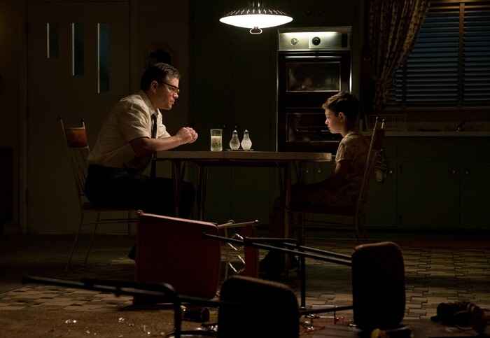 This image released by Paramount Pictures shows Matt Damon, left, and Noah Jupe in a scene from "Suburbicon." ( Hilary Bronwyn Gayle/Paramount Pictures via AP)