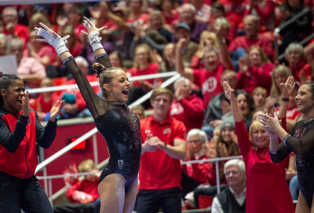 (Rick Egan  |  The Salt Lake Tribune)   Hunter Dula lands her dismount from the uneven bars, in PAC-12 gymnastics action between the UCLA Bruins and the University of Utah, at the Jon M. Huntsman Center, Saturday, Feb. 23, 2019.