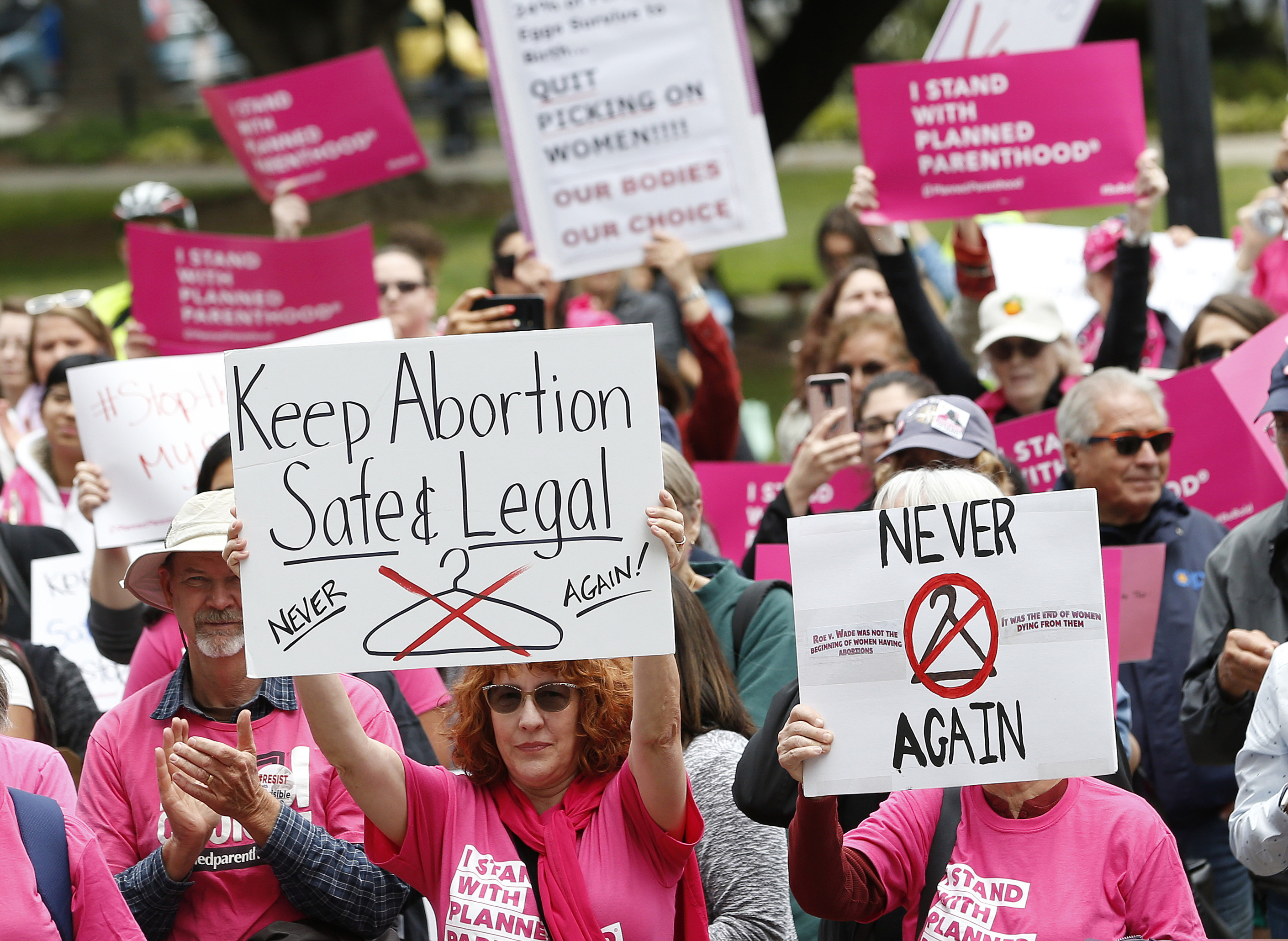 (Rich Pedroncelli | AP Photo) In this May 21, 2019 photo, People gather at the state Capitol to rally in support of abortion rights in Sacramento, Calif.