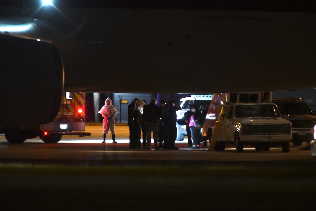 (Nick Ingram | AP) American passengers from the cruise ship, MV Hondius that was stricken with hantavirus, arrived in Omaha, Nebraska after flying from Tenerife, Spain on Monday, May 11, 2026.