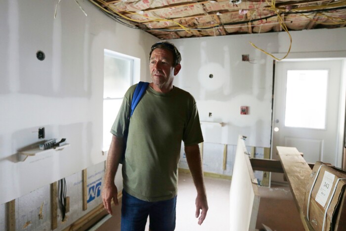 (Jason Dearen | AP Photo) This Sept. 22, 2017 photo shows Gary Ursy in a damaged room at St. Francis House, a homeless shelter in St. Augustine, Fla. Ursy was evacuated from the homeless shelter during Hurricane Irma. When he arrived at a hurricane shelter he was given a yellow wristband and segregated from the rest of the evacuees. Advocated for the homeless say the ill treatment of homeless people during disasters is a national problem that reflects the lack of state and local emergency planning to deal with that population.