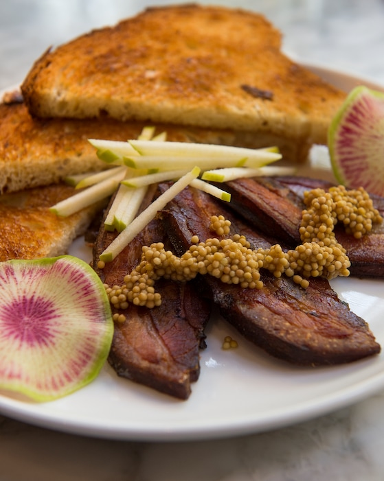 (Leah Hogsten  |  The Salt Lake Tribune) White Horse Spirits and Kitchen's PB&J with Berkshire pork belly, bourbon maple onion jam, brioche, radish and apple, $10.