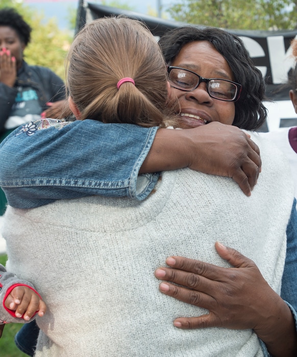 (Rick Egan  |  The Salt Lake Tribune)  Antoinette Harmon, the sister of Patrick Harmon, gets a hug from Preslie Pauar, at a Black Lives Matter protest Sept. 30 against police brutality.