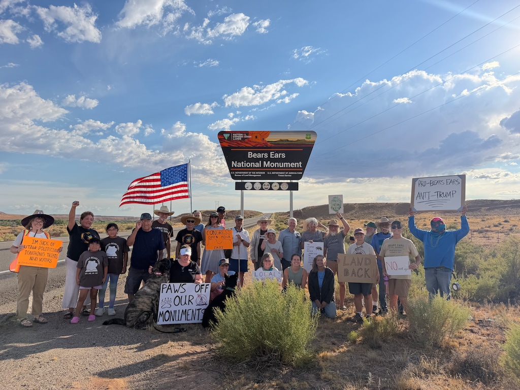 (Ani Pham) People protest President Donald Trump shrinking Bears Ears National Monument at the monument sign near Bluff on Monday, July 20, 2026.