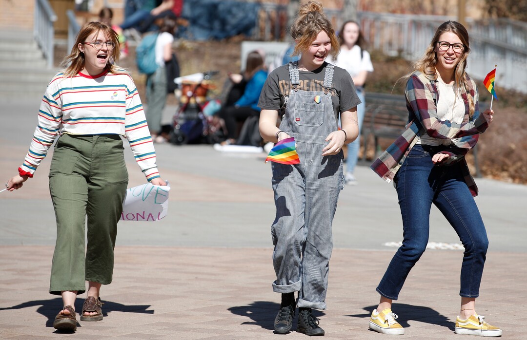 (George Frey  |  special to The Salt Lake Tribune) BYU students and others gather in front of the Ernest L. Wilkinson Student Center on the campus of Brigham Young University to protest BYUÕs rollback of a newly announced policy change on LGBTQ students on March 5, 2020 in Provo, Utah.