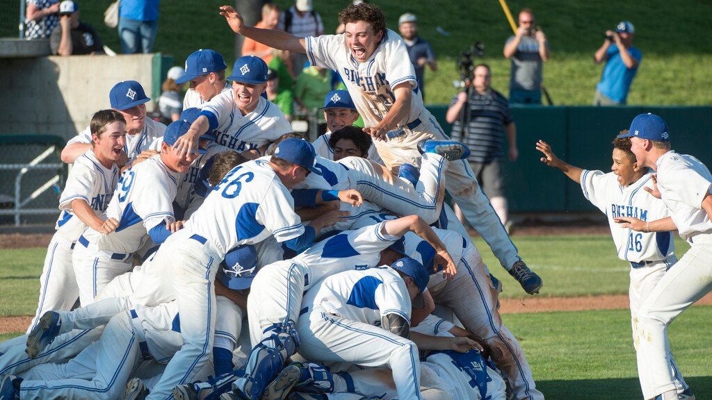 (Rick Egan  |  The Salt Lake Tribune)  The Bingham Miners storm the field to celebrate their win over Riverton, in 6A state baseball State  Championship game, at UVU in Orem, Friday, May 25, 2018.