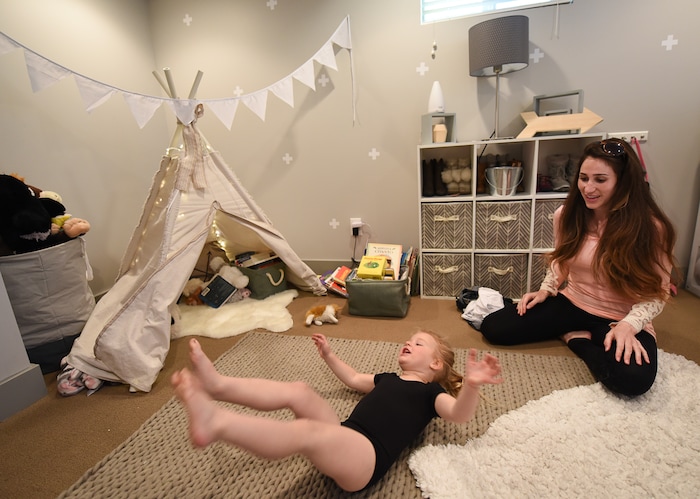(Francisco Kjolseth | The Salt Lake Tribune) Audrey Allen, 3, does a forward roll on the floor as her mother Rachel gets her ready for a gymnastics class on Thursday, May 3, 20018. Rachel and her husband Scott, both anesthesiologists in a burn unit are trying to balance a free range childhood with safety practices to prevent their kids experiencing the injuries they witness at work every day. Utah is believed to be the first state to pass a law that prevents parents from being prosecuted for allowing mature kids with good judgement to do things alone, provided they are otherwise cared for.
