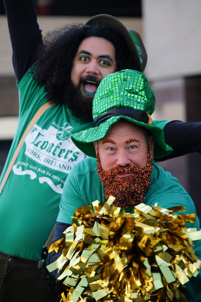 (Francisco Kjolseth | The Salt Lake Tribune) Noni Blake, left, and Brian Morris join the fun as Salt Lake CityÕs Irish community celebrates their 41st annual St. PatrickÕs Day Parade with crowds lining up to take in the festivities.