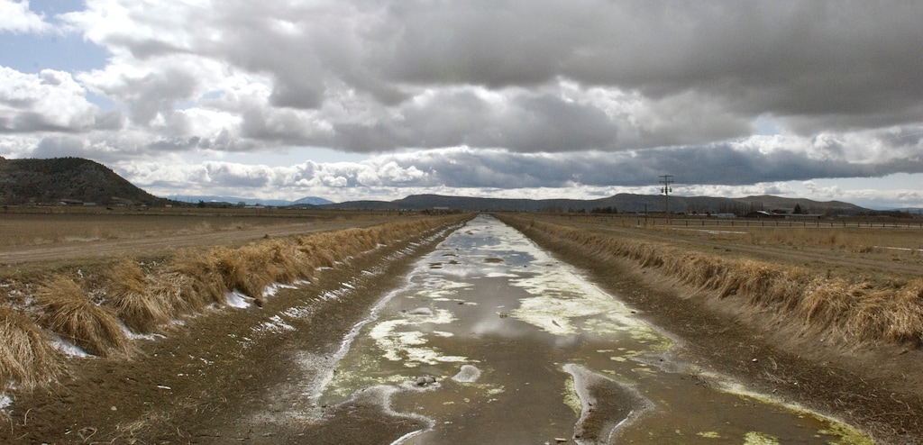 (Jeff Barnard | The Associated Press) In this March 10, 2010, file photo, an irrigation canal stands dry on the Klamath Reclamation Project near Klamath Falls, Ore. President Donald Trump has ordered the government to streamline regulations that he says are hindering work on four major water projects in the Western United States. Trump signed a memorandum Friday, Oct. 19,2018 aimed at helping the Central Valley Project and the California State Water Project in California, the Klamath Irrigation Project in Oregon and the federal Columbia River system in the Pacific Northwest.