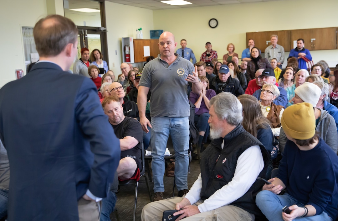 (Keith Johnson  |  for The Salt Lake Tribune) Newly elected Utah Congressman Ben McAdams, representing Utah's 4th District (left), listens to Stephen Olsen, a 20 year FBI agent and furloughed federal employee, during a town hall meeting held by McAdams at the Redwood Recreational Center in West Valley City, Utah on Jan. 19, 2019. McAdams held the town hall meeting to make good on a promise to be more accessible to constituents, a criticism he leveled against former congresswoman Mia Love during McAdam's campaign. 