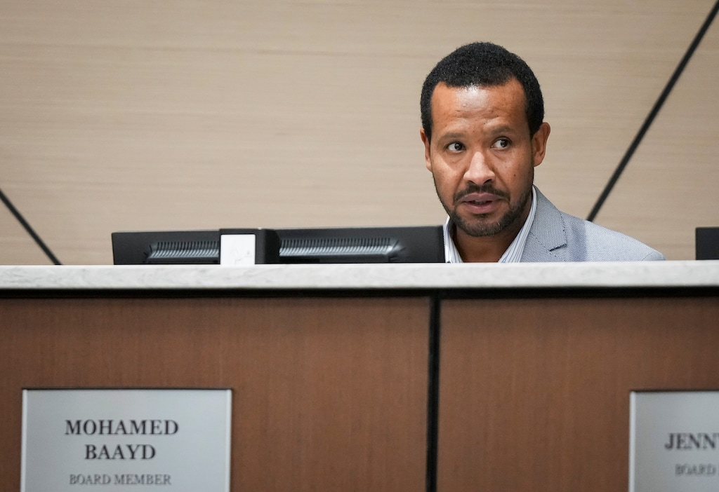 (Bethany Baker  |  The Salt Lake Tribune) Salt Lake City school board member Mohamed Baayd asks a question during a school board meeting at the Salt Lake City School District building in Salt Lake City on Tuesday, Dec. 3, 2024.