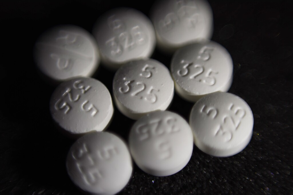 (Patrick Sison | The Associated Press) This Tuesday, Aug. 15, 2017 file photo shows an arrangement of pills of the opioid oxycodone-acetaminophen, also known as Percocet, in New York. Cities and counties of all sizes have sued companies that make and distribute prescription opioids. Among the plaintiffs so far: Philadelphia; the state of Ohio; Princeton, West Virginia; the Cherokee Nation; and a consortium of counties across Wisconsin.