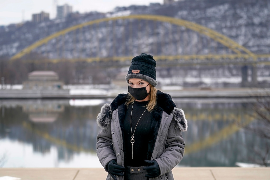(Keith Srakocic | AP file photo) Allissa Starr poses for a photograph Feb. 8 along the north shore of the Allegheny River in Pittsburgh. Starr worked about a week every month at a brothel in Pahrump, Nev., outside of Las Vegas. Then the pandemic led to the shuttering of Nevada's licensed bordellos, the only place where prostitution is legal in the state, and they have remained closed since March, leaving sex workers like Starr struggling to pay the bills and turning to alternatives like "virtual" dates.
