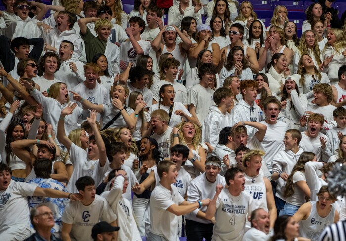 (Rick Egan | The Salt Lake Tribune) The Corner Canyon Chargers celebrate their win over the American Fork Cavemen, for  the Boys 6A State Championship at Weber State, on Saturday, March 4, 2023.