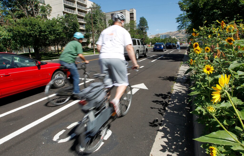 Al Hartmann  |   The Salt Lake Tribune
Bicyclist rides along Salt Lake City's separated bikeway along 300 East and 700 South.