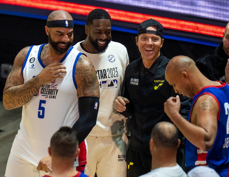 (Rick Egan | The Salt Lake Tribune) Carlos Boozer, Dwyane Wade, and Ryan Smith react as Richard Jefferson prepares to play in the NBA All-Star Celebrity Game, at the Jon M. Huntsman Center, on Friday, Feb. 17, 2023.