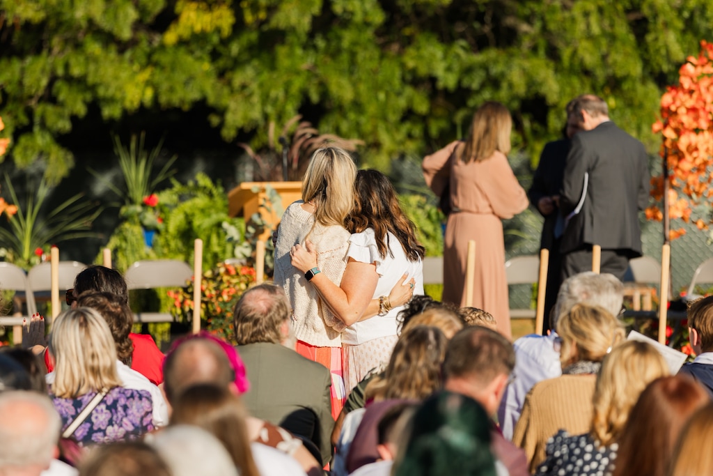 (The Church of Jesus Christ of Latter-day Saints) Two women embrace during a groundbreaking ceremony for a new Latter-day Saint chapel in Grand Blanc, Michigan, on Monday, Sept. 28, 2026.