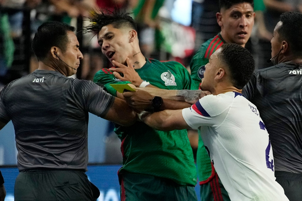 (John Locher | AP Photo) Sergino Dest of the United States pushes Gerardo Arteaga of Mexico during the second half of a CONCACAF Nations League semifinals soccer match Thursday, June 15, 2023, in Las Vegas.