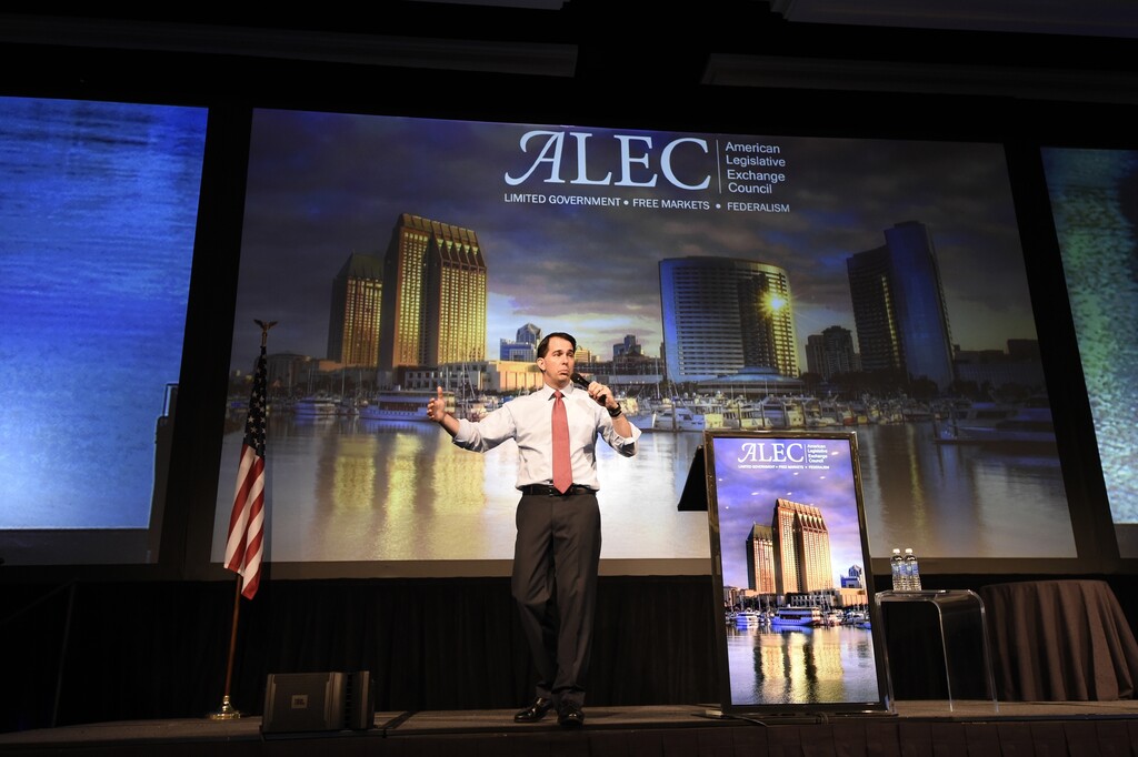 (Denis Poroy | AP file photo) In this July 23, 2015, file photo, then-Wisconsin Gov. Scott Walker speaks at the American Legislative Exchange Council 42nd annual meeting in San Diego, Calif. For four decades, the well-funded conservative group, ALEC, has helped write legislation to help sympathetic state lawmakers rein in unions, expand charter schools and limit taxes.