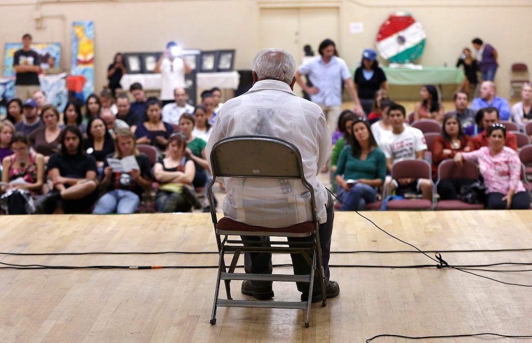 (Jim Urquhart  |  Tribune file photo) Archie Archuleta reads from the book Yo Soy Joaquin during a 2012 event in Salt Lake City opposing ArizonaÕs HB 2281, the law used to eliminate the Mexican American Studies Programs in the Tucson Unified School District earlier that year. 