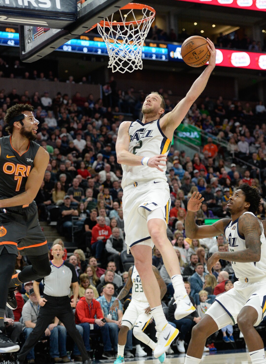 (Francisco Kjolseth  |  The Salt Lake Tribune) Utah Jazz forward Joe Ingles (2) stretches out for a basket as the Utah Jazz host the Orlando Magic in their NBA basketball game at Vivint Smart Home Arena in Salt Lake City on Tuesday. Dec. 17, 2019.