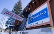 (Bethany Baker  |  The Salt Lake Tribune) Brent Lange, the board chair for the nonprofit Snowland Foundation Inc, removes the sign that reads ÒComing Soon!Ó as Snowland Recreation and Education Area opens its lone rope tow to the public in Fairview Canyon on Saturday, Jan. 17, 2026.
