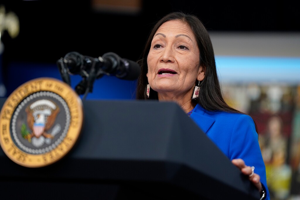 (Evan Vucci | AP Photo) Interior Secretary Deb Haaland speaks during a Tribal Nations Summit during Native American Heritage Month, in the South Court Auditorium on the White House campus, on Nov. 15, 2021, in Washington. Secretary Haaland on Friday, Nov. 19, 2021, declared "squaw" to be a derogatory term and said she is taking steps to remove the term from federal government use and to replace other derogatory place names.