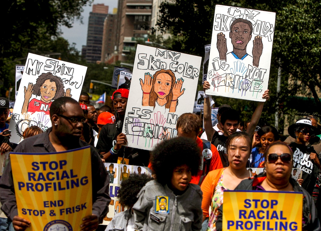 (Seth Wenig | AP file photo) This photo from Sunday, June 17, 2012, shows protestors with signs during a silent march to end "stop-and-frisk" program in New York. During the Bloomberg administration, civil rights groups went to court to end the NYPD's use of a tactic known as "stop and frisk," which involved detaining, questioning and sometimes searching people deemed suspicious by officers.