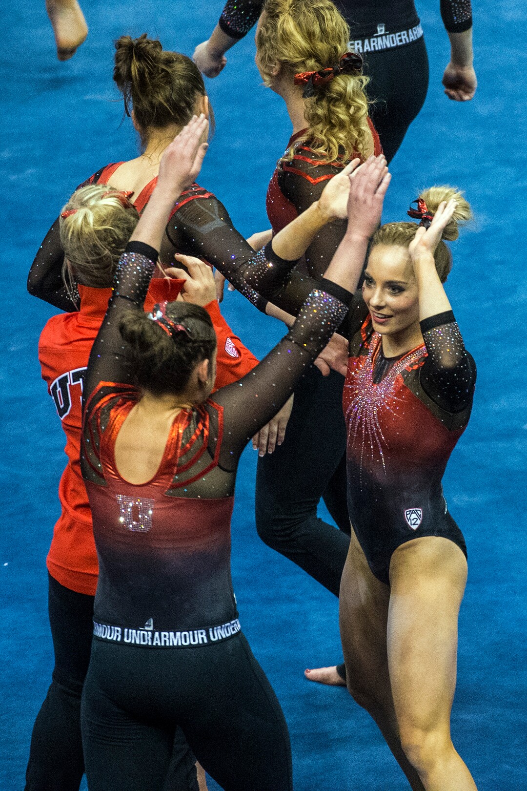 Chris Detrick  |  The Salt Lake TribuneUtah's Mykayla Skinner celebrates with her teammates after competing on the floor during the gymnastics meet against Brigham Young University at the Marriott Center Friday January 13, 2017. 