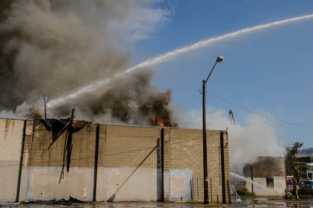 (Trent Nelson  |  The Salt Lake Tribune) Crews work to extinguish a fire at 800 South 200 West in Salt Lake City on Wednesday, Sept. 9, 2020.