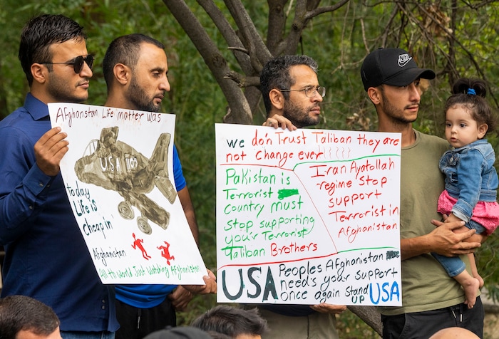 (Rick Egan | The Salt Lake Tribune) 
Afghans gather at Murray Park for a prayer vigil in honor of UtahÕs Afghan refugees, onSaturday, Aug. 21, 2021.