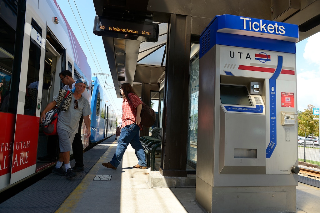 (Leah Hogsten  | Tribune file photo) A steady flow of TRAX train riders enter and exit trains at the 1300 South station. UTA is conducting a study of how to revise its fare system, and found some surprising facts about its riders. That includes that 1 of every 3 is a university student using passes provided by their schools.