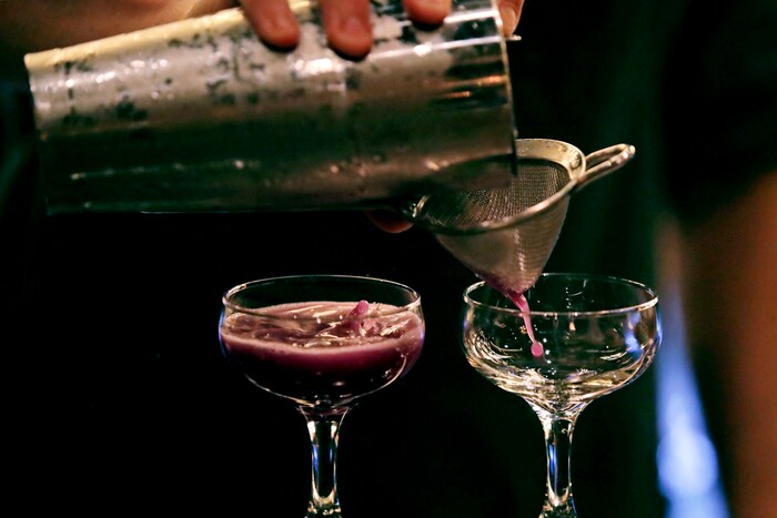 In this Dec. 10, 2019, photo cocktails are crafted at Wink & Nod, basement-dwelling, speakeasy-like bar, in Boston. Americans are consuming more alcohol per capita now than in the time leading up to Prohibition, when alcohol opponents successfully made the case that excessive drinking was ruining family life. (AP Photo/Charles Krupa)