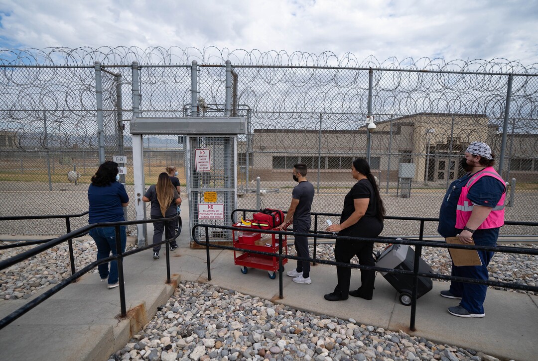 (Francisco Kjolseth | The Salt Lake Tribune) Nomi Health, the direct healthcare company coordinating COVID-19 testing and vaccination efforts across the country and Utah Department of Corrections collaborate to provide the COVID-19 vaccine for incoming inmates at the Utah State Prison in Draper, on Tuesday, July 27, 2021.