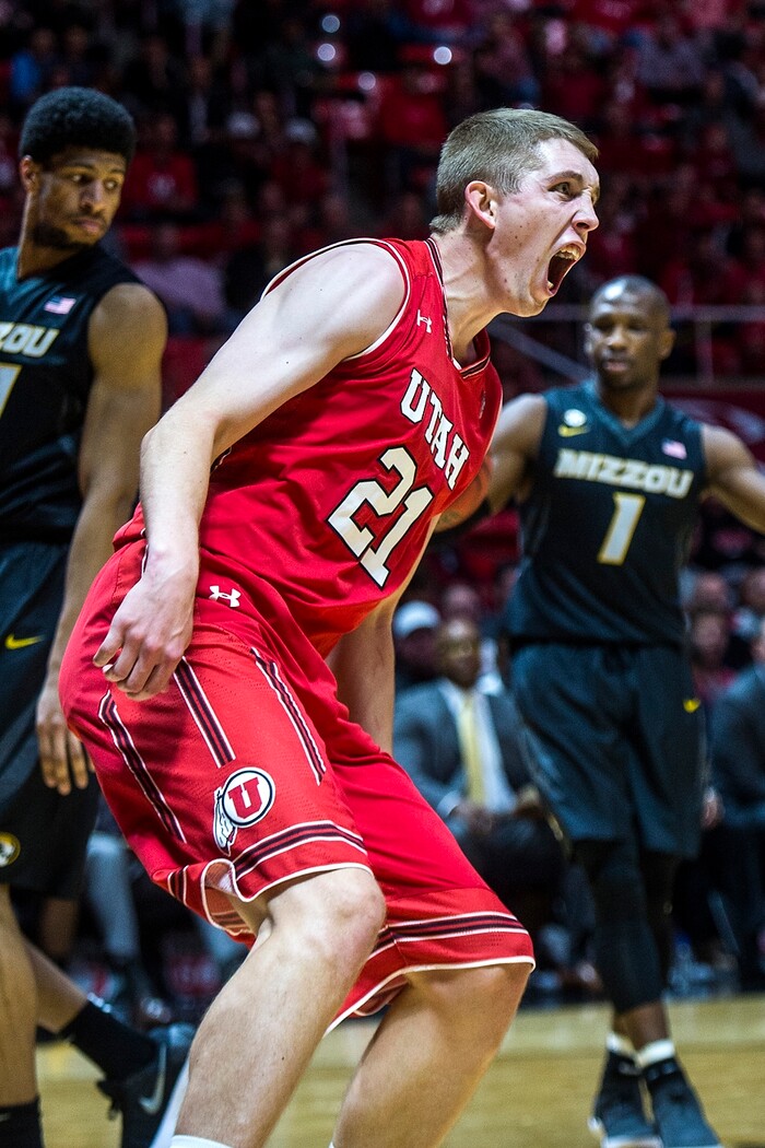 (Chris Detrick  |  The Salt Lake Tribune)  Utah Utes forward Tyler Rawson (21) celebrates after dunking the ball past Missouri Tigers forward Jordan Barnett (21) during the game at the Jon M. Huntsman Center Thursday, November 16, 2017.   
