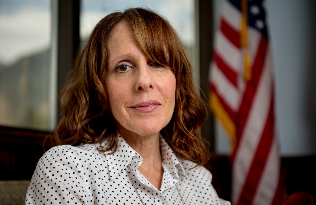 (Isaac Hale | The Daily Herald via AP) Patty Johnston, bureau chief of investigations with the Utah County Attorney's Office, poses for a portrait in Provo on Thursday, Aug. 22, 2019. Johnston, the first woman to hold the position, is hoping to be a mentor to other women working in law enforcement after she worked her way from a corrections officer to deputy to her new post over nearly three decades, the Daily Herald reports.