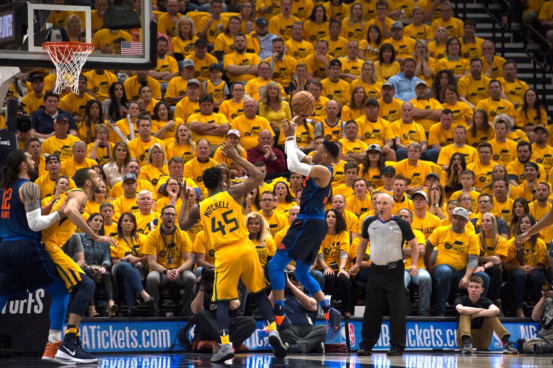(Scott Sommerdorf | The Salt Lake Tribune)Oklahoma City Thunder guard Russell Westbrook (0) shoots over Utah Jazz guard Donovan Mitchell (45) during first quarter play. The Thunder led the Jazz 22-18 at the end of the 1st quarter during Game 6 of the first round playoff game, Friday, April 27, 2018.