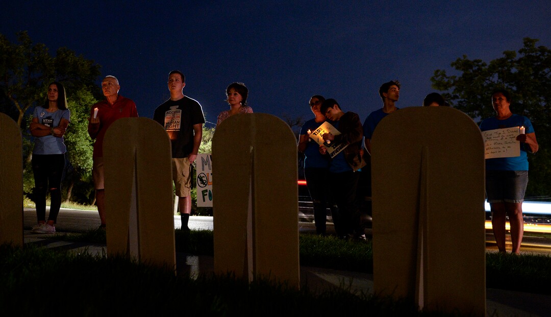 (Leah Hogsten  |  The Salt Lake Tribune)  Cardboard headstones with the names of diabetes patients who died because they could not afford the high cost of insulin line the sidewalk.  Diabetes patients, their families and supporters rallied for those struggling to stay alive amid the high cost of insulin and paid tribute to those who have died from the disease on the Capitol lawn, Saturday, Sept. 7, 2019.