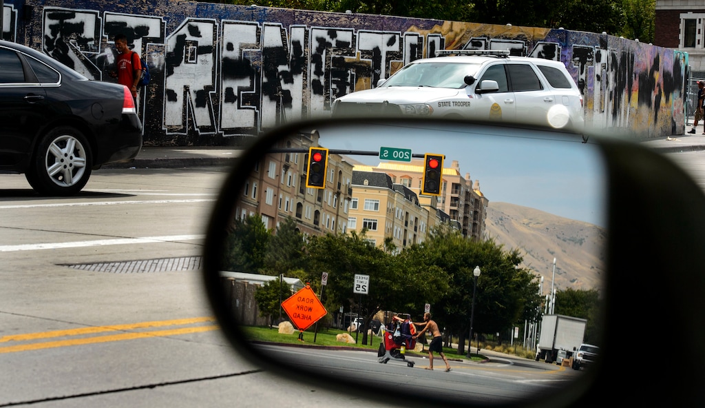 (Steve Griffin  |  The Salt Lake Tribune)  Law enforcement officers from several agencies increase their presence in the Rio Grand homeless area in Salt Lake City Monday August 14, 2017.