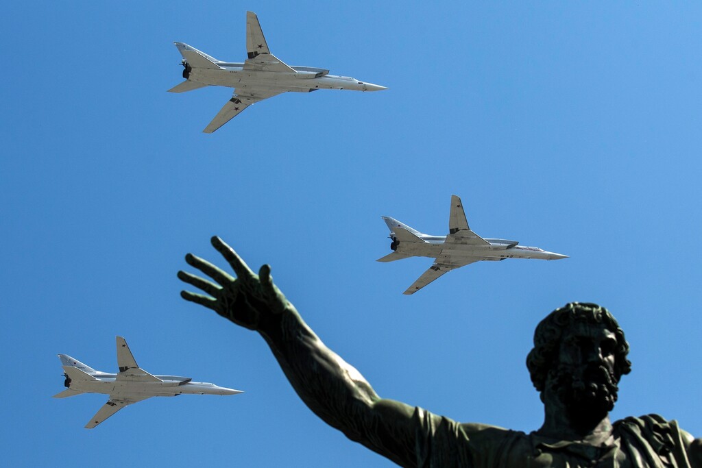 FILE - In this Monday, May 9, 2016 file photo, Russian Tu-22M-3 long-range bombers fly during the Victory Day milita (AP Photo/Pavel Golovkin, File)