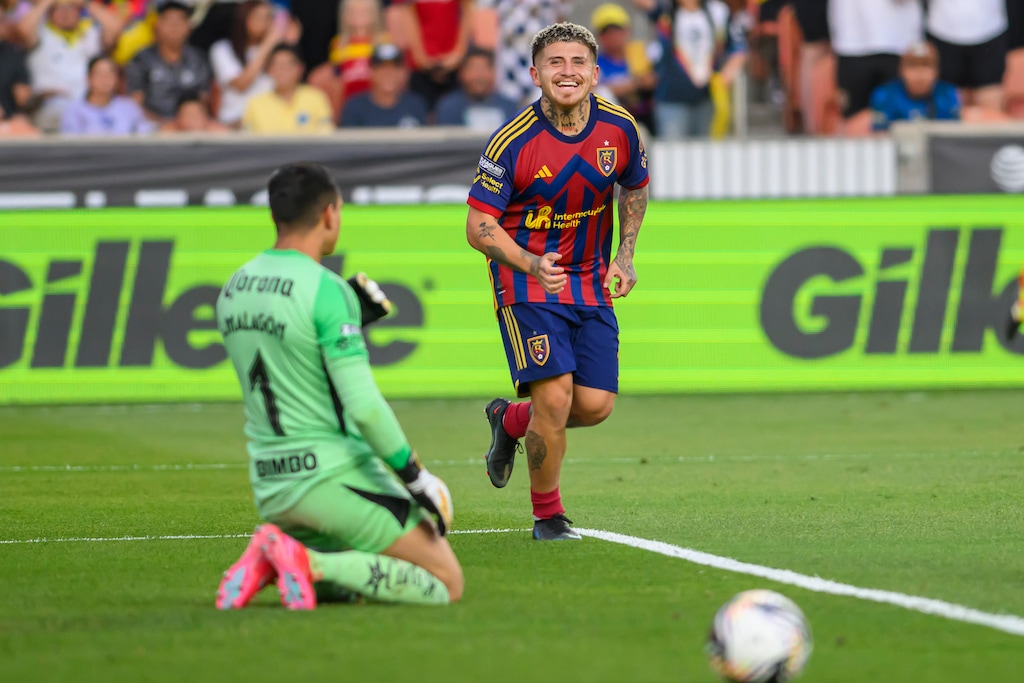 (Tyler Tate | AP) Real Salt Lake midfielder Diego Luna (right) smiles and celebrates a goal scored on Club America goaltender Ángel Malagón (left) during a Leagues Cup soccer match, July 30, 2025, Sandy, Utah.