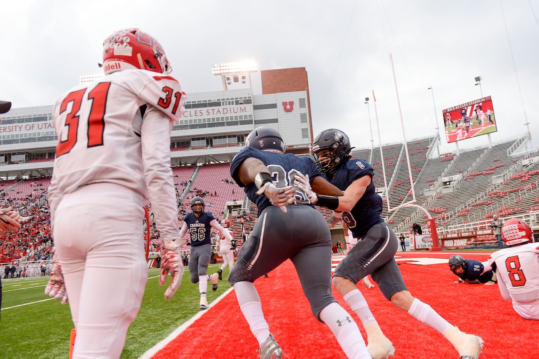(Leah Hogsten  |  The Salt Lake Tribune)  Corner CanyonÕs John Glavin scores a touchdown. Corner Canyon High School takes on American Fork High School during the 6A State Championship football title, Nov. 22, 2019 at Rice-Eccles Stadium.